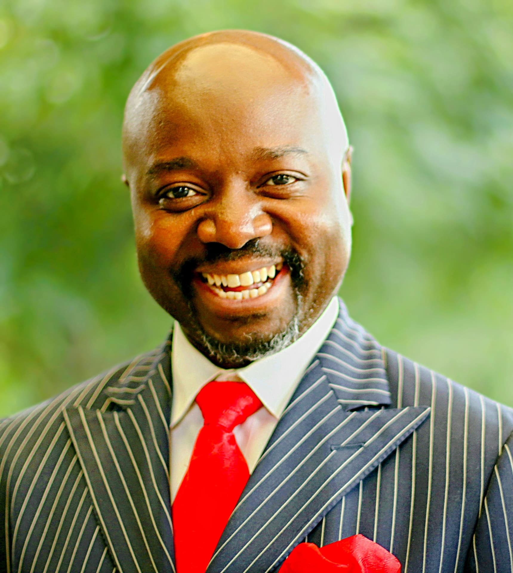 Portrait of L. Christian Amougou, Hospitality Expert.